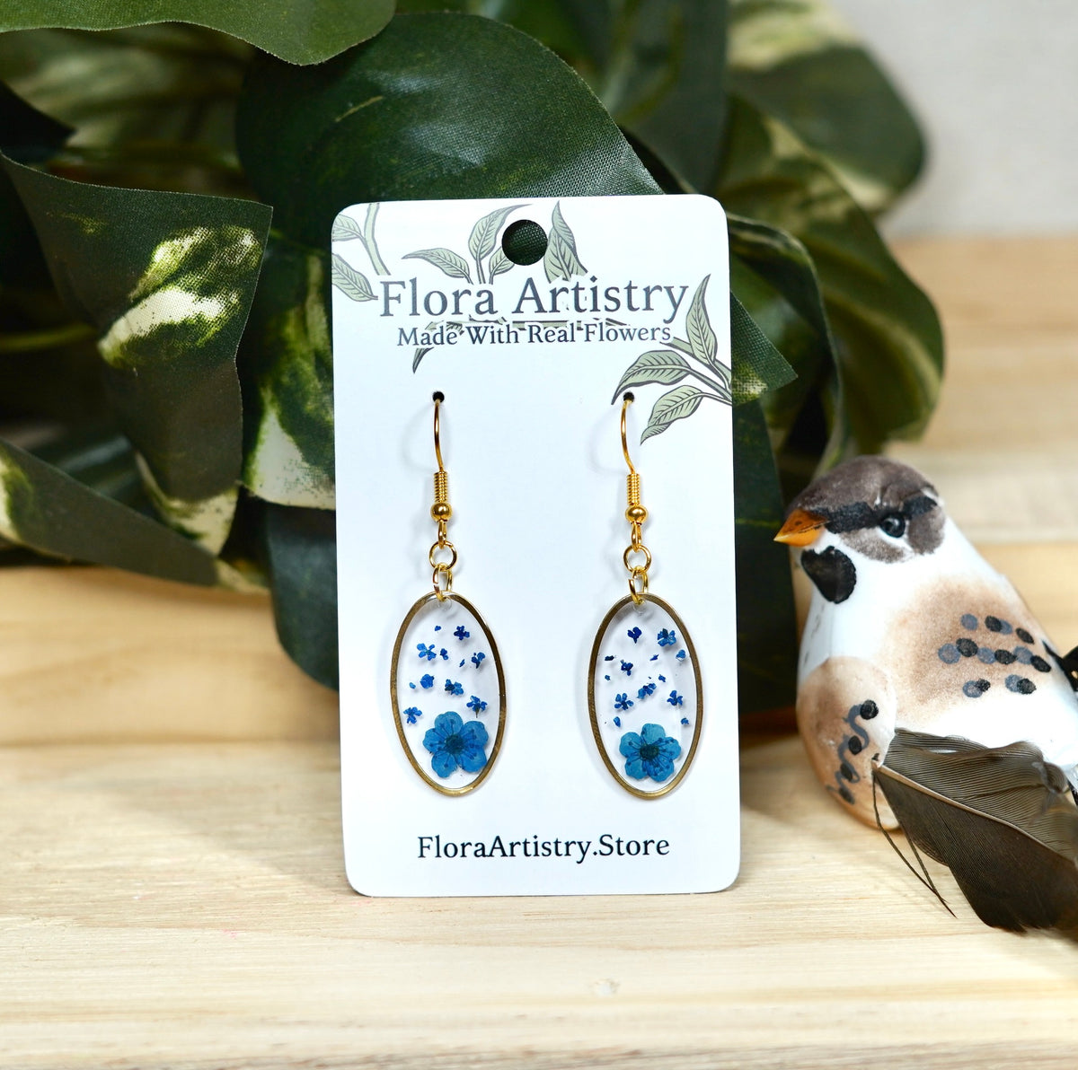 Blue Flower with Falling Petals Oval Dangle Gold Earring