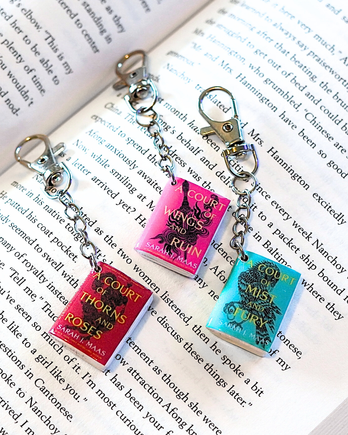 A Court of Thorns and Roses miniature book keychain