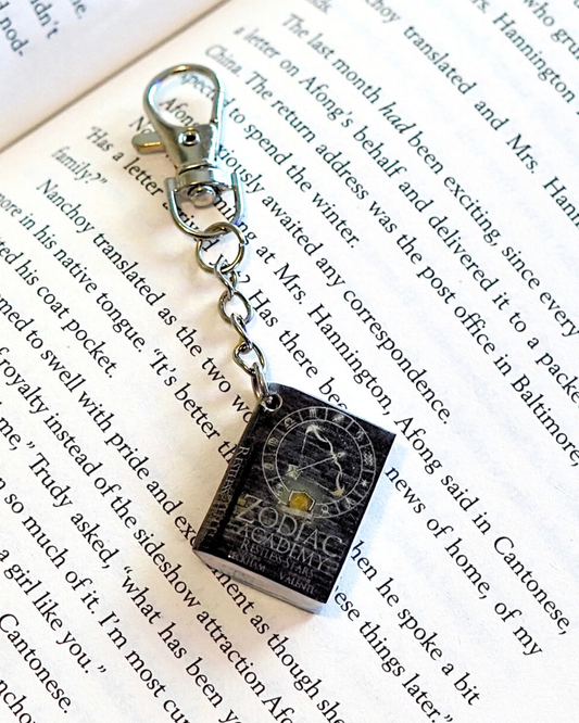 Zodiac Academy: Restless Stars miniature book keychain